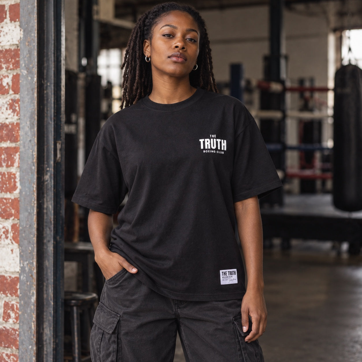 Black Club Logo Tee worn in a boxing gym