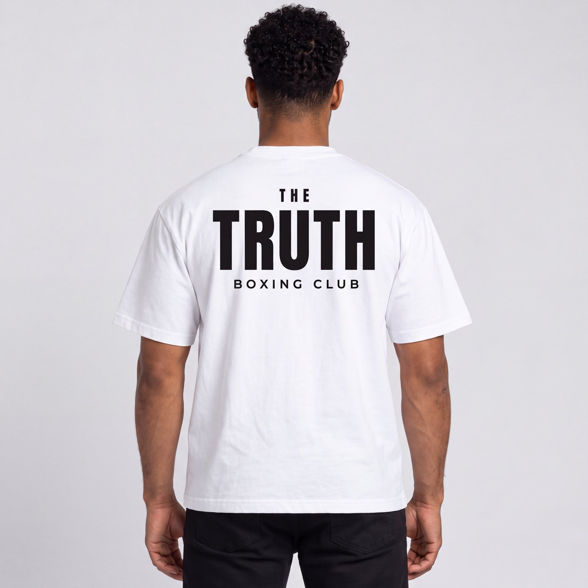 Back of the white Club Logo Tee with large black club wordmark